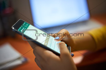 Girl Typing Phone Message On Social Network At Night