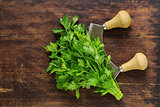 green natural organic parsley on a wooden table