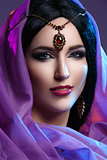 Beautiful girl with arabic makeup