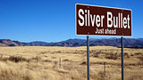 Silver Bullet brown road sign