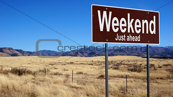 Weekend brown road sign