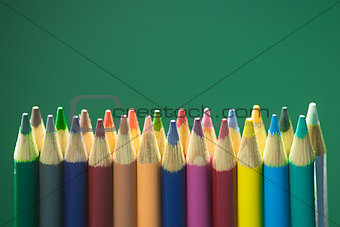 Colored Pencils on Green Backdrop.jpg