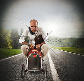 Businessman driving a fast car