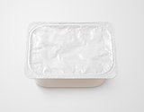 Top view of rectangular aluminum foil cover food tray on gray