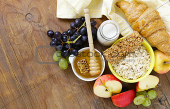 set of products for a healthy breakfast, oatmeal, fruit, honey