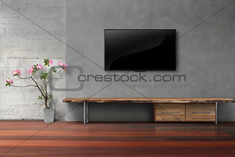 Living room led tv on concrete wall with empty wooden stand