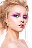 Beautiful young model with bright make-up