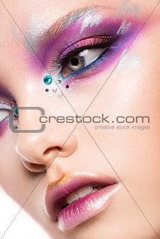 Beautiful young model with bright make-up