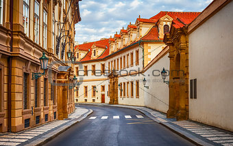 Old street among ancient houses in Praha