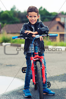 Cute boy riding a bike