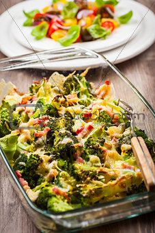 Baked broccoli with tomato salad