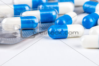 Blue capsules macro view