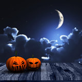 3D Halloween background with pumpkins and night sky