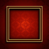 Old picture frame on red damask background 