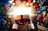 Santa opening a gift box