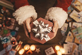 Santa Claus giving a Christmas present