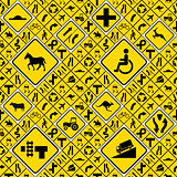 Different yellow road signs seamless pattern
