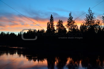 Romantic twilight. Pongoma river, North Karelia, Russia