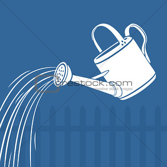 Watering can watering the earth