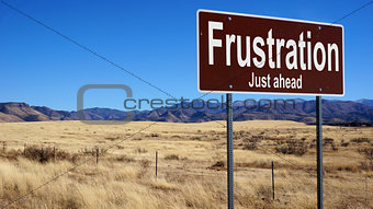 Frustration brown road sign