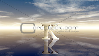 metal uppercase letter k under cloudy sky - 3d rendering
