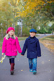 Happy Kids in Autumn Park