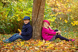 Happy Kids in Autumn Park