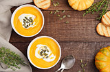 Pumpkin cream soup with cream and pumpkin seeds