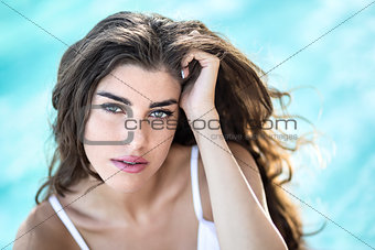 Close-up portrait of girl in swimsuit