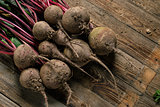 Young beets on wooden table