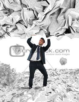 Covered by a rain of documents of bureaucracy