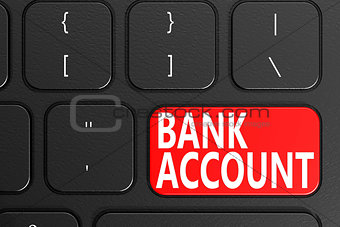 Bank account on black keyboard