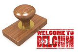 Red rubber stamp with welcome to Belgium