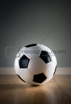 Soccer ball on hardwood floor