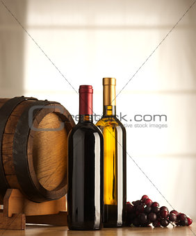 Wine selection with barrel and grapes