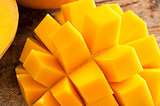 Delicious yellow mango peeled and cut into squares