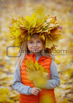 Girl having fun in autumn park
