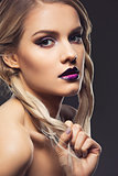 Beautiful girl with dark purple lips