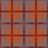 Seamless pattern as a knitted fabric mainly in brown hues