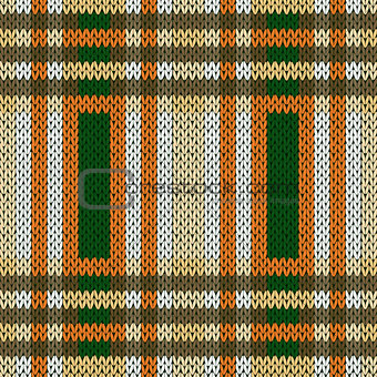 Seamless knitted pattern in brown, green and white