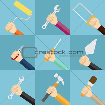 Set of hands holding tools.