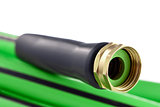 Garden hose brass nozzle close-up on white background