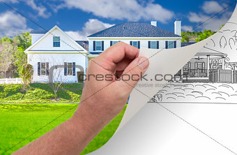 Hand Turning Page of Custom Home Photograph to Drawing