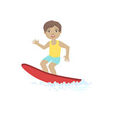 Boy Surfing On The Red Board