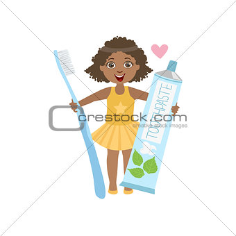 Girl Holding Giant Toothpaste Tube And Toothbrush