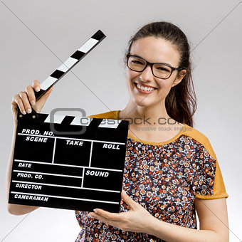 Woman with a clapboard