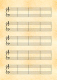 a4 size yellow sheet of old paper with music note stave