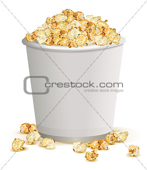 White paper cup full of popcorn
