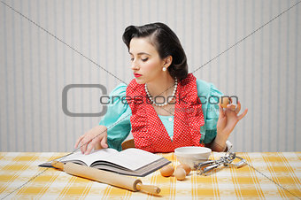 Girl reads a cookbook