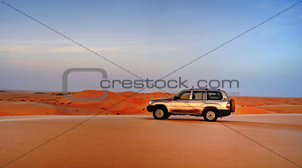 Jeep at the top of the dune